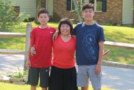 Kasie Malcolm with his brother Alex and mother Yumiko Malcolm