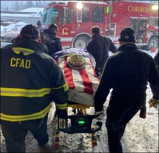 EMT transporting the patient