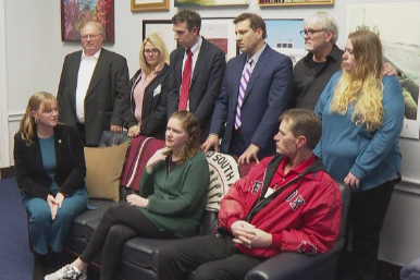Caption: Berman & Simmons Attorney Travis Brennan and Gideon Asen attorney Ben Gideon escorted six people directly affected by October’s mass shooting to meet with Maine’s Congressional Delegation.   